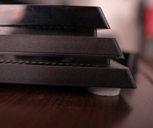 patin adhésif sous l'un des coins de la ps4